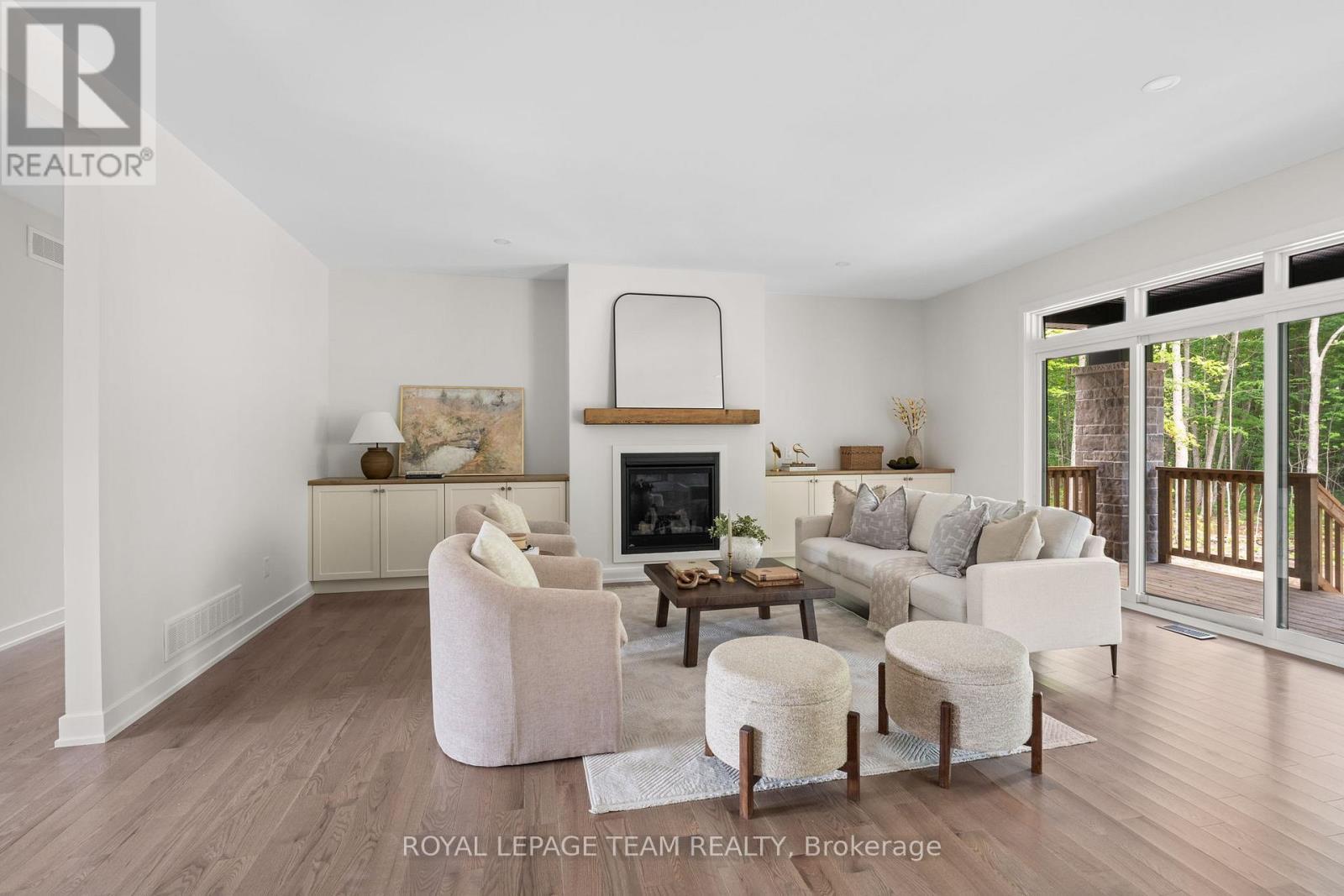 Similar model image; builder variations possible. - 47 Hogan Drive, Mcnab/Braeside, ON - Indoor Photo Showing Living Room With Fireplace