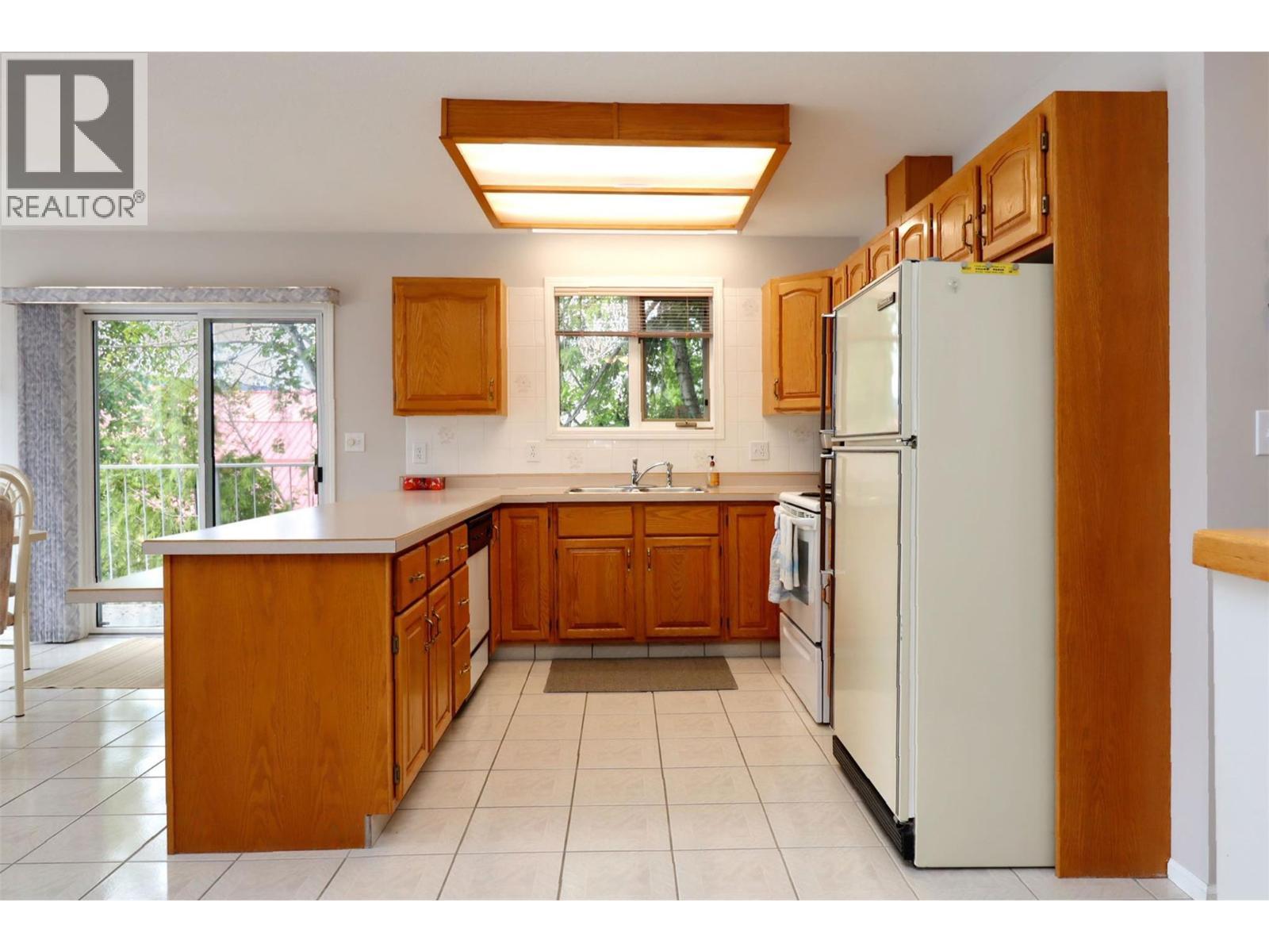 8298 Squilax Anglemont Road, Anglemont, BC - Indoor Photo Showing Kitchen With Double Sink