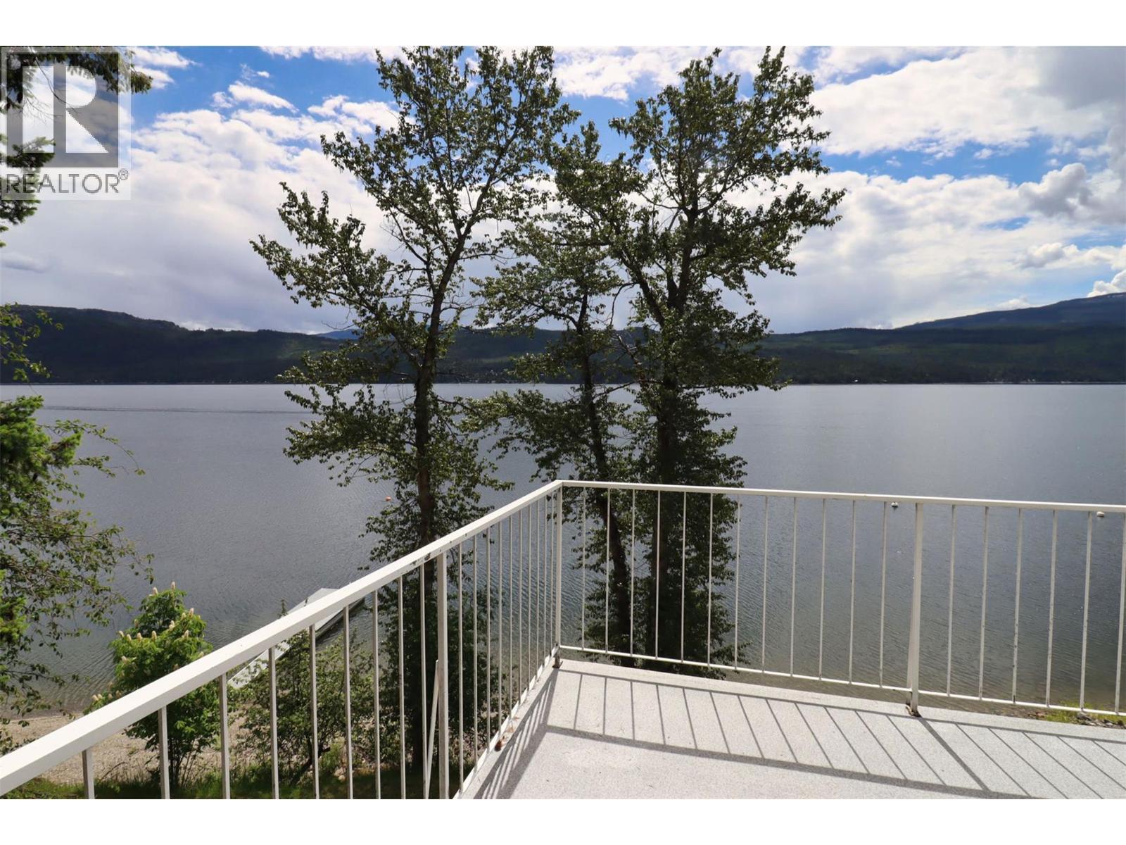 8298 Squilax Anglemont Road, Anglemont, BC - Outdoor With Body Of Water With Balcony With View