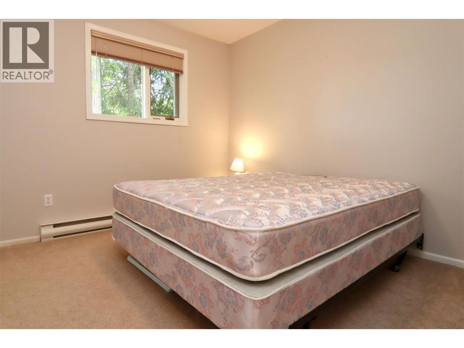8298 Squilax Anglemont Road, Anglemont, BC - Indoor Photo Showing Bedroom