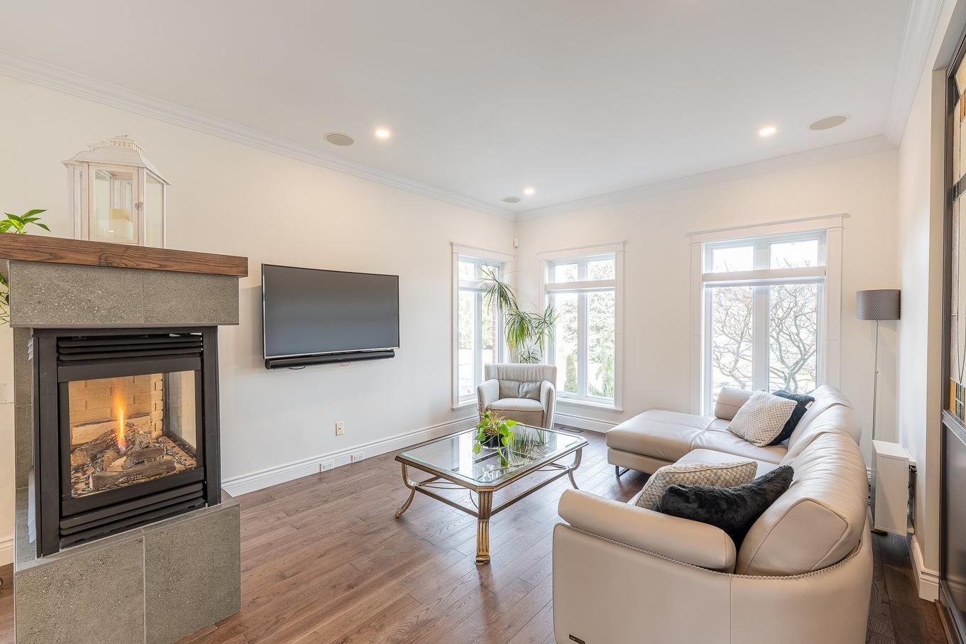 Salon - 1006 Rue Arthur-Dumouchel, Boucherville, QC - Indoor Photo Showing Living Room With Fireplace