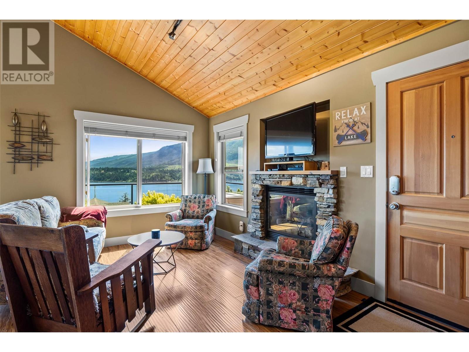 2633 Squilax Anglemont Road Unit# 198, Lee Creek, BC - Indoor Photo Showing Living Room With Fireplace