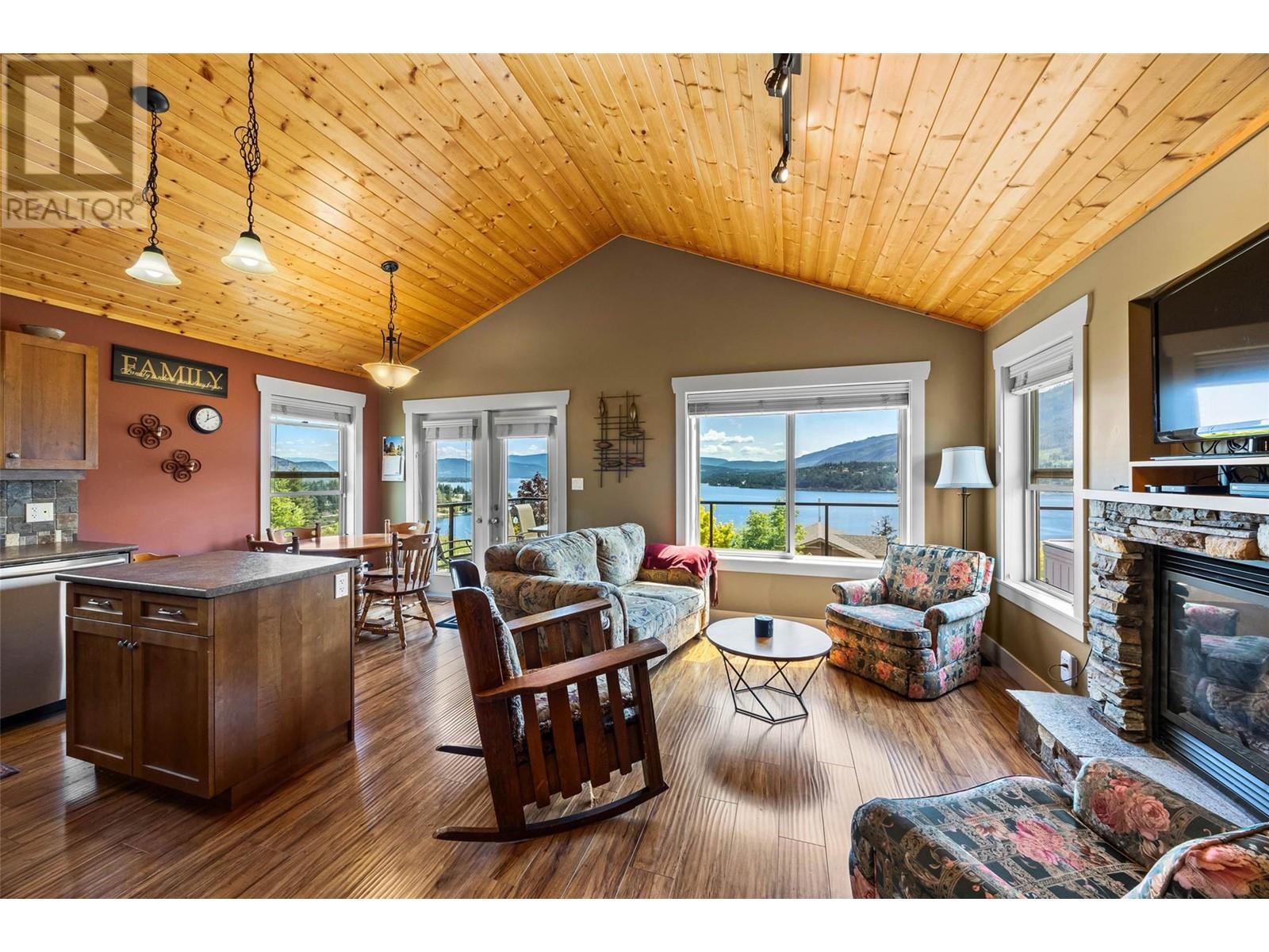 2633 Squilax Anglemont Road Unit# 198, Lee Creek, BC - Indoor Photo Showing Living Room With Fireplace