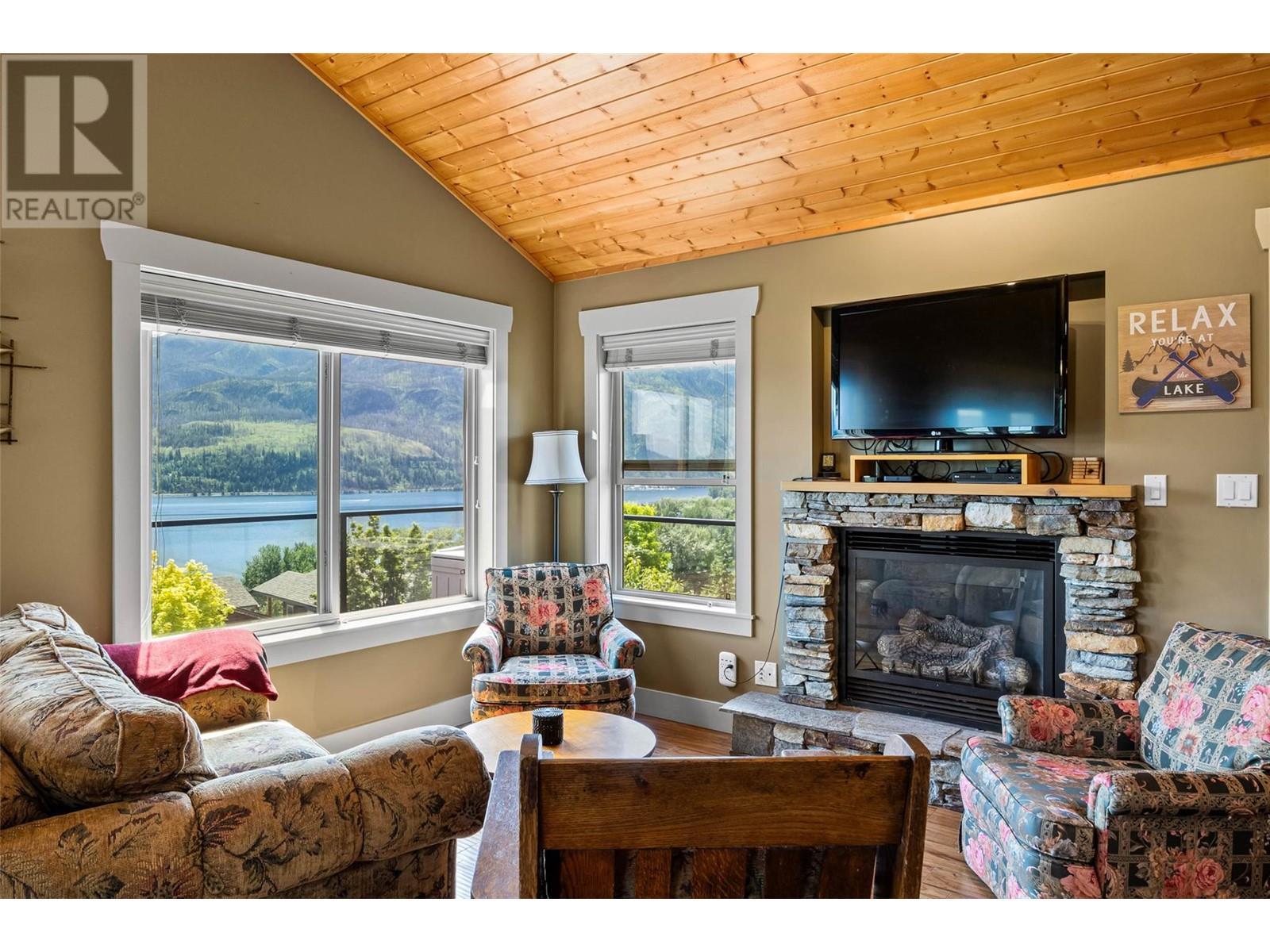 2633 Squilax Anglemont Road Unit# 198, Lee Creek, BC - Indoor Photo Showing Living Room With Fireplace