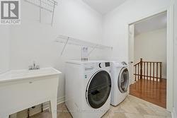 Laundry Room w/ Door to Backyard -