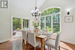 Dining Room w/ Dual Sliding doors to each deck -