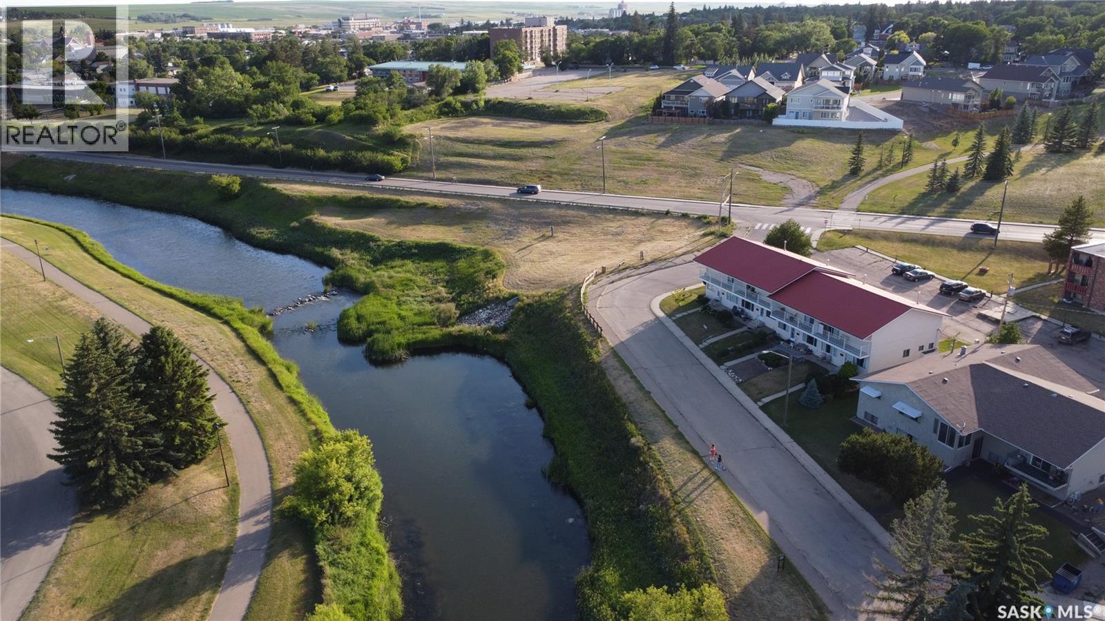 520 Bray Street E, Swift Current, SK - Outdoor With Body Of Water With View