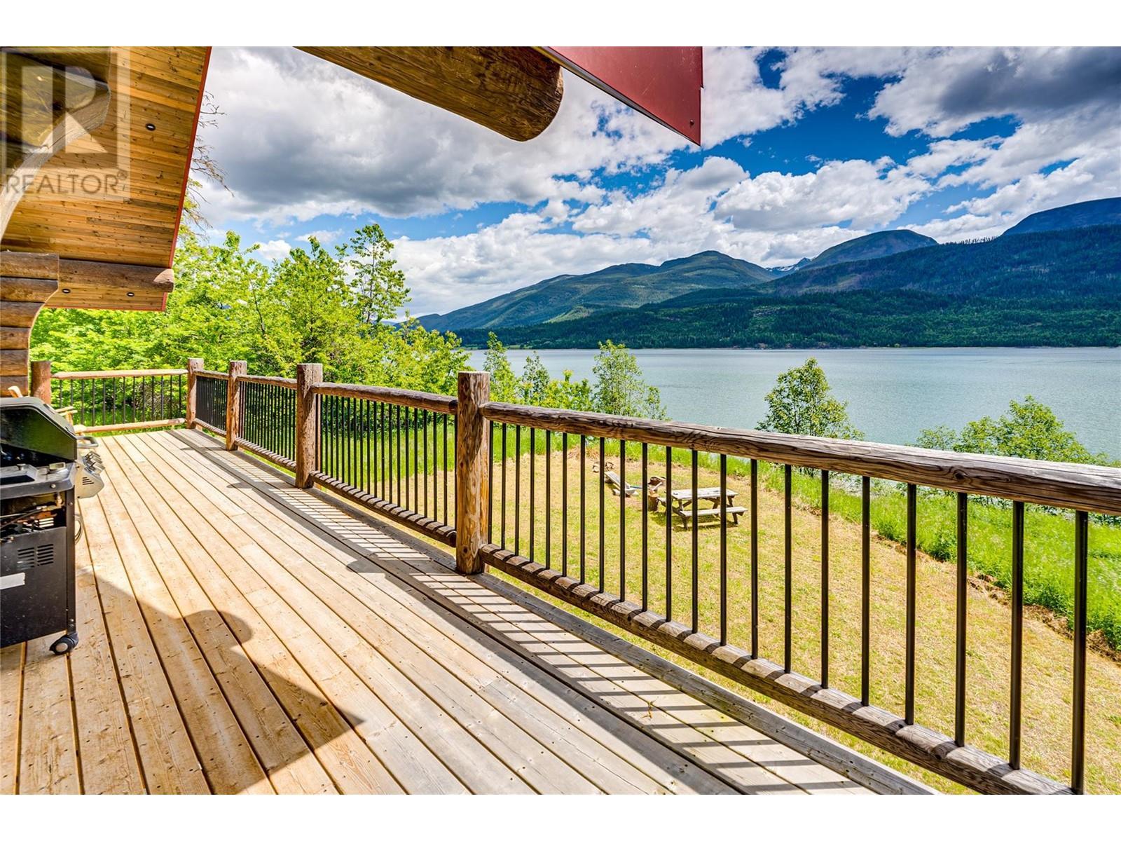 682 Lower Inonoaklin Road, Edgewood, BC - Outdoor With Body Of Water With Deck Patio Veranda With Exterior