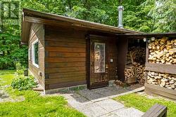 Door to studio (with wood storage for woodstove) -