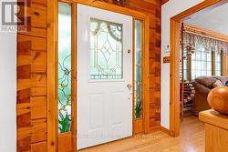 Foyer door with hand-crafted stain glass panels -