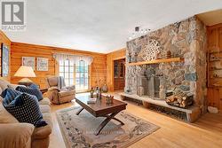 Livingroom Georgian fieldstone fireplace -