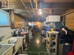 Laundry storage area. Cantina under front porch -