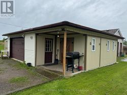 Double garage with a double depth shed with hydro -