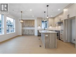 Spacious Kitchen with Island, plenty of Natural Light -