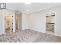 Primary Bedroom with Walk-In Closet and Ensuite -