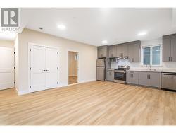 Basement Suite Living Room looking into Kitchen -
