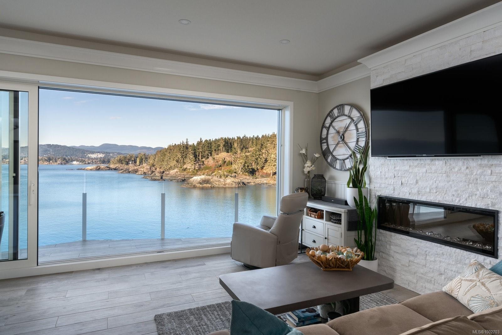 6B-1000 Sookepoint Pl, Sooke, BC - Indoor Photo Showing Living Room With Fireplace