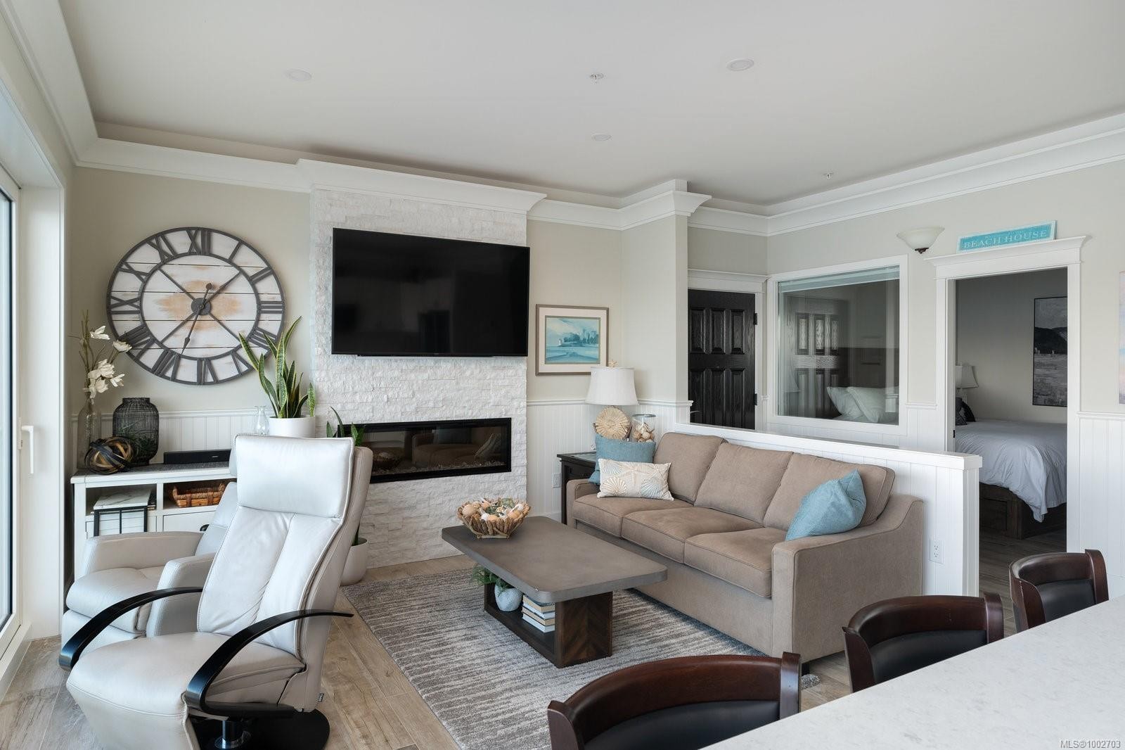 6B-1000 Sookepoint Pl, Sooke, BC - Indoor Photo Showing Living Room With Fireplace