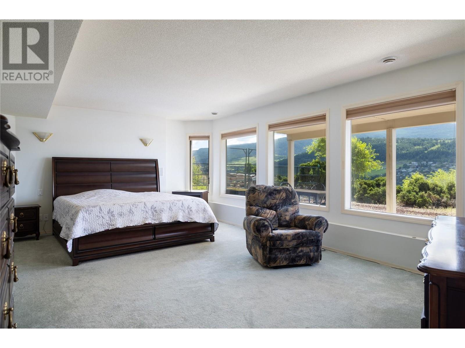 Master #2 - 8827 Michael Drive, Coldstream, BC - Indoor Photo Showing Bedroom