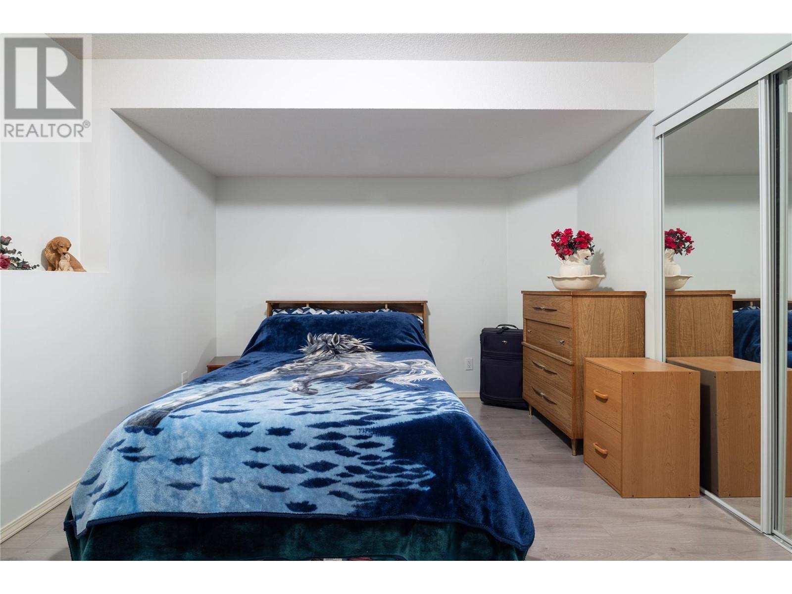 Bedroom #3 - 8827 Michael Drive, Coldstream, BC - Indoor Photo Showing Bedroom