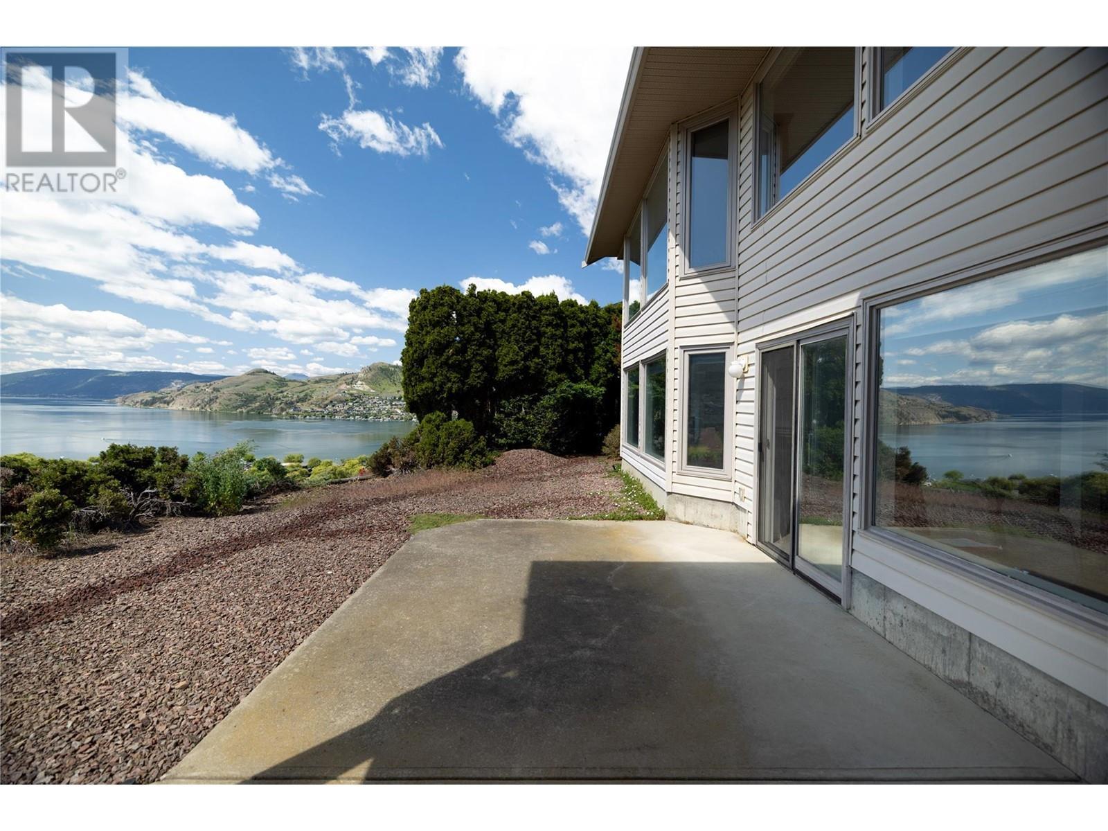 8827 Michael Drive, Coldstream, BC - Outdoor With Body Of Water With View