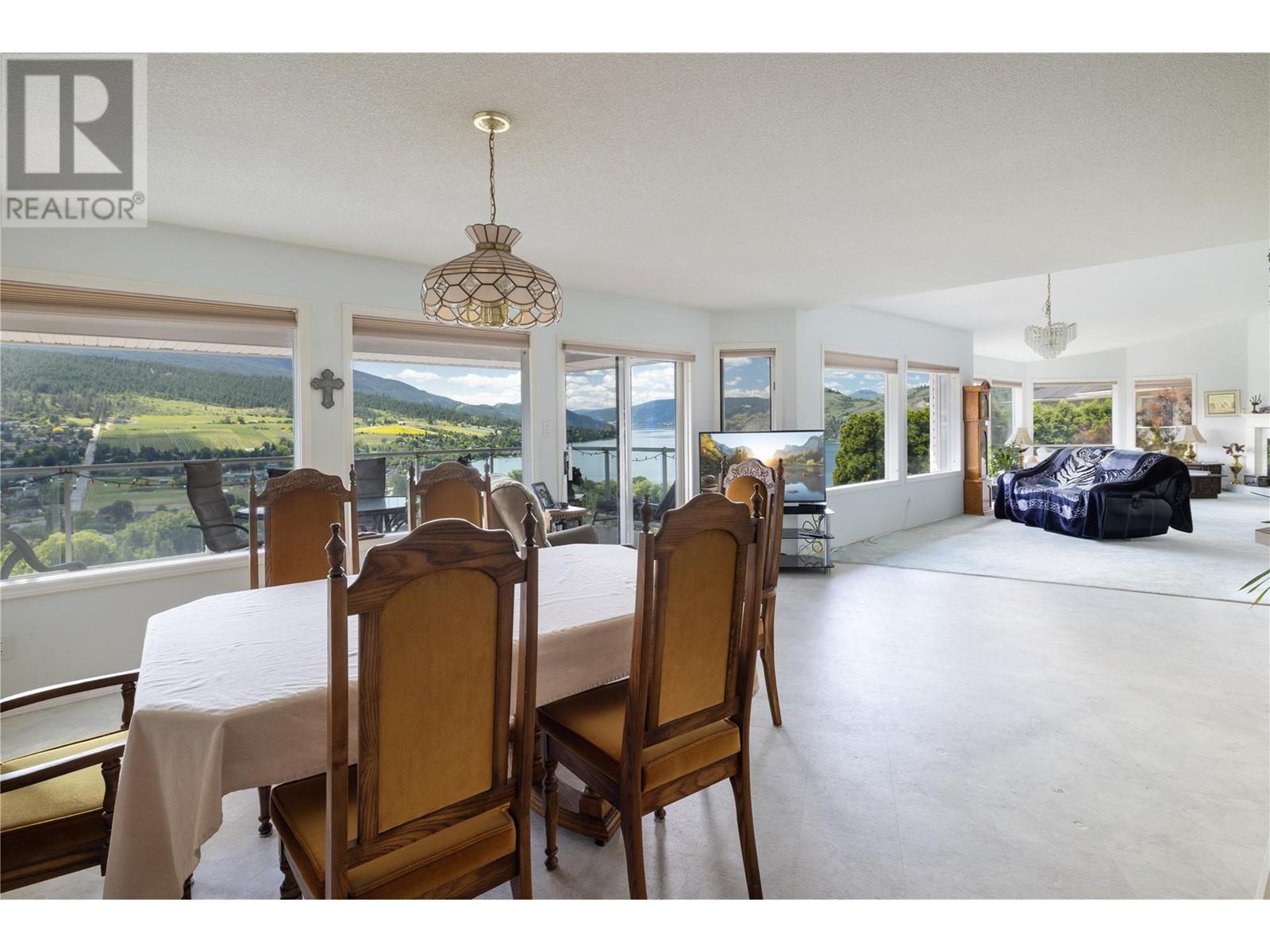 Angle!! - 8827 Michael Drive, Coldstream, BC - Indoor Photo Showing Dining Room