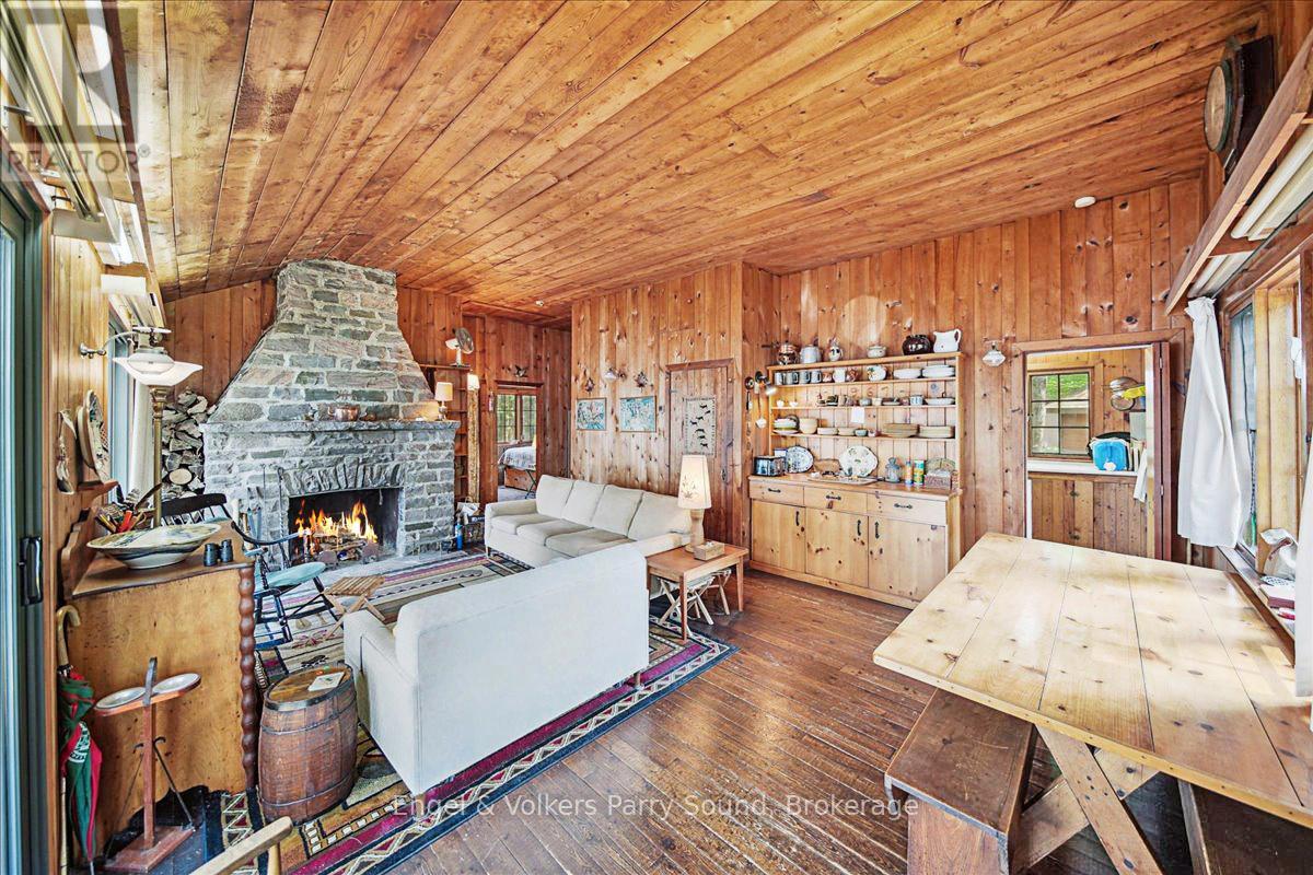 53 Birdwood Lane, Mcdougall, ON - Indoor With Fireplace