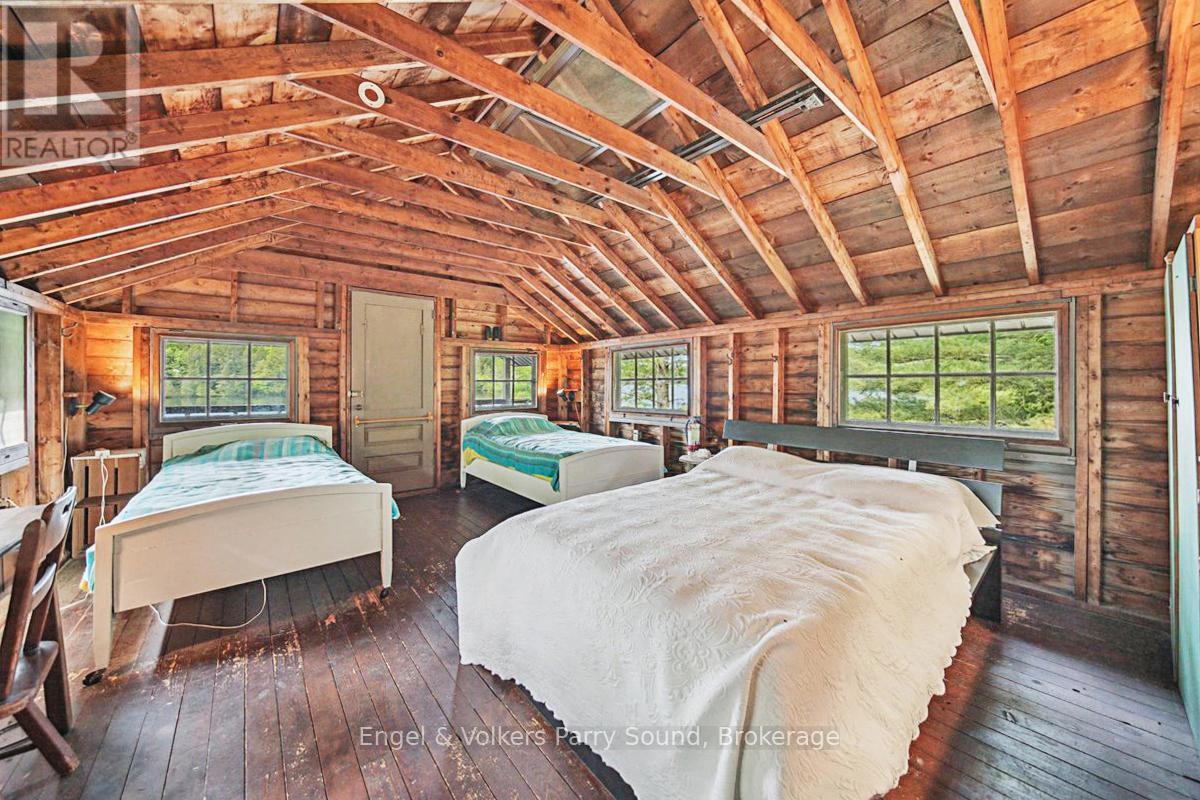 53 Birdwood Lane, Mcdougall, ON - Indoor Photo Showing Bedroom