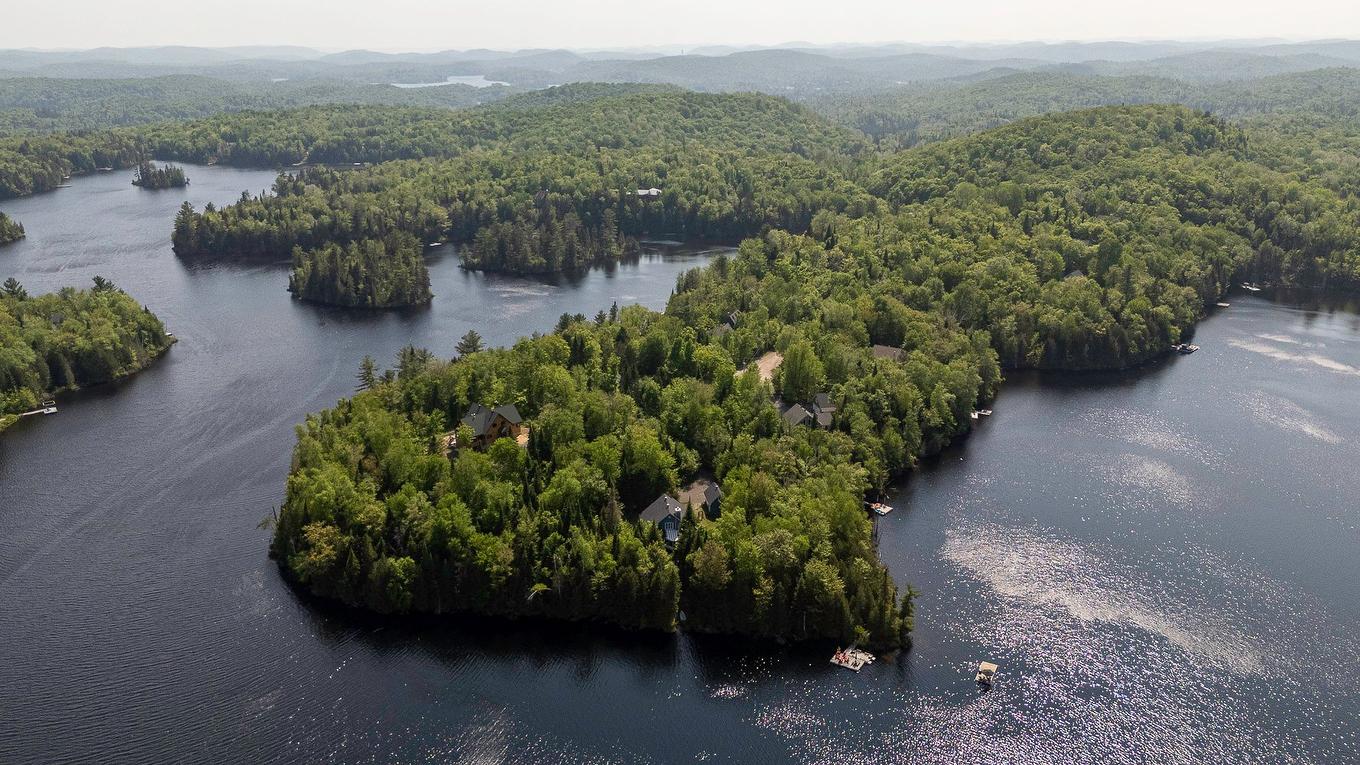 Aerial photo - 33 Rue Du Canard, Sainte-Marguerite-Du-Lac-Masson, QC - Outdoor With Body Of Water With View