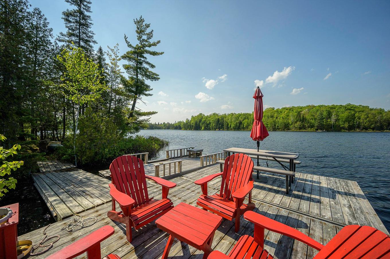 Access to a body of water - 33 Rue Du Canard, Sainte-Marguerite-Du-Lac-Masson, QC - Outdoor With Body Of Water With Deck Patio Veranda With View