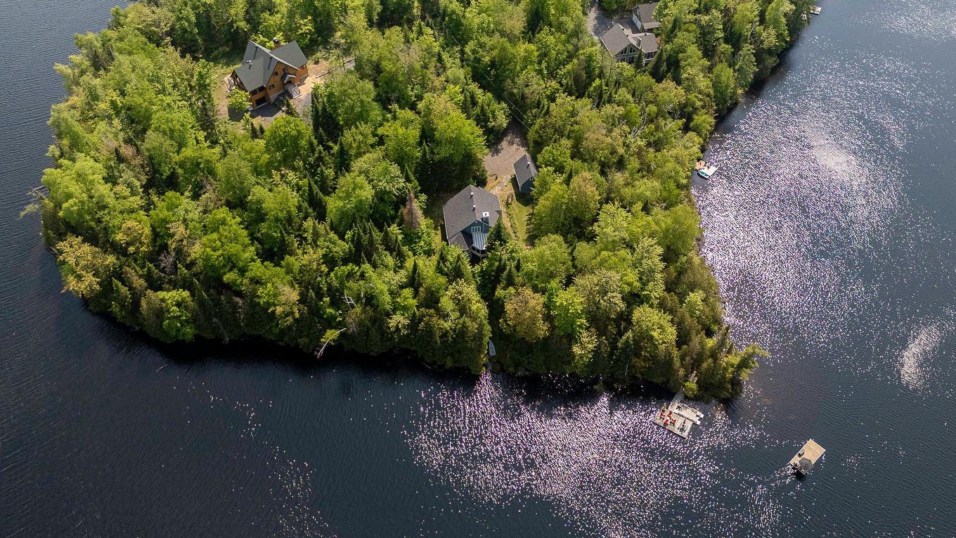 Aerial photo - 33 Rue Du Canard, Sainte-Marguerite-Du-Lac-Masson, QC - Outdoor With Body Of Water With View