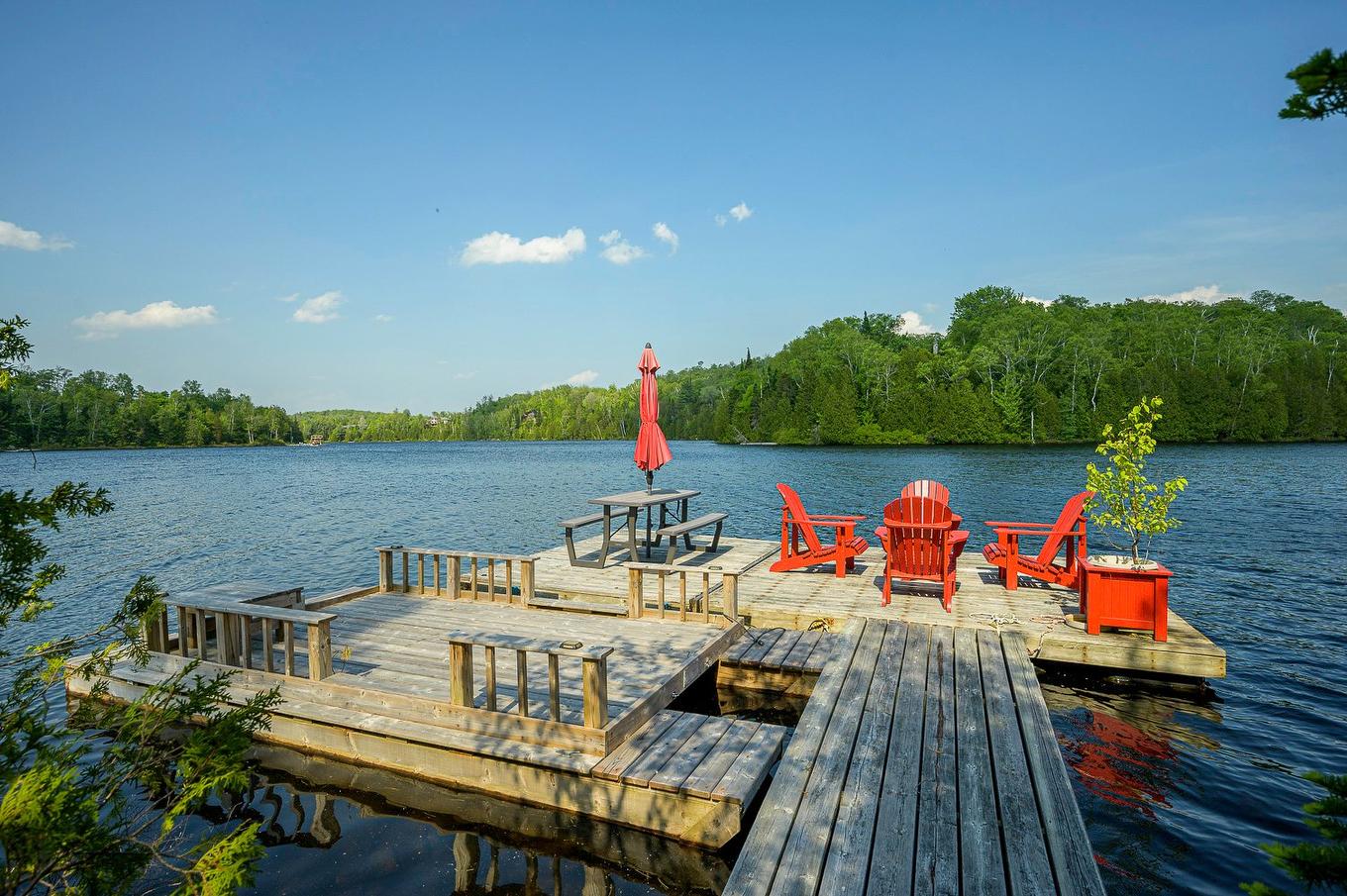 Access to a body of water - 33 Rue Du Canard, Sainte-Marguerite-Du-Lac-Masson, QC - Outdoor With Body Of Water With Deck Patio Veranda With View