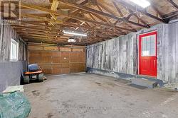 2 car garage with door into the entry/living room -
