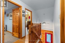 Upstairs offers 3 bedrooms and full bathroom. -