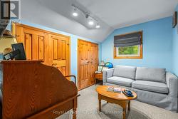 3rd bedroom used as a den with double closets. -