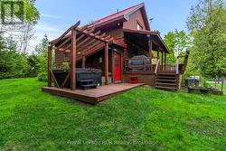 Lower level walk out to deck with hot tub. -