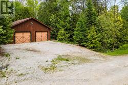 28x26 insulated/heated garage w/separate driveway -