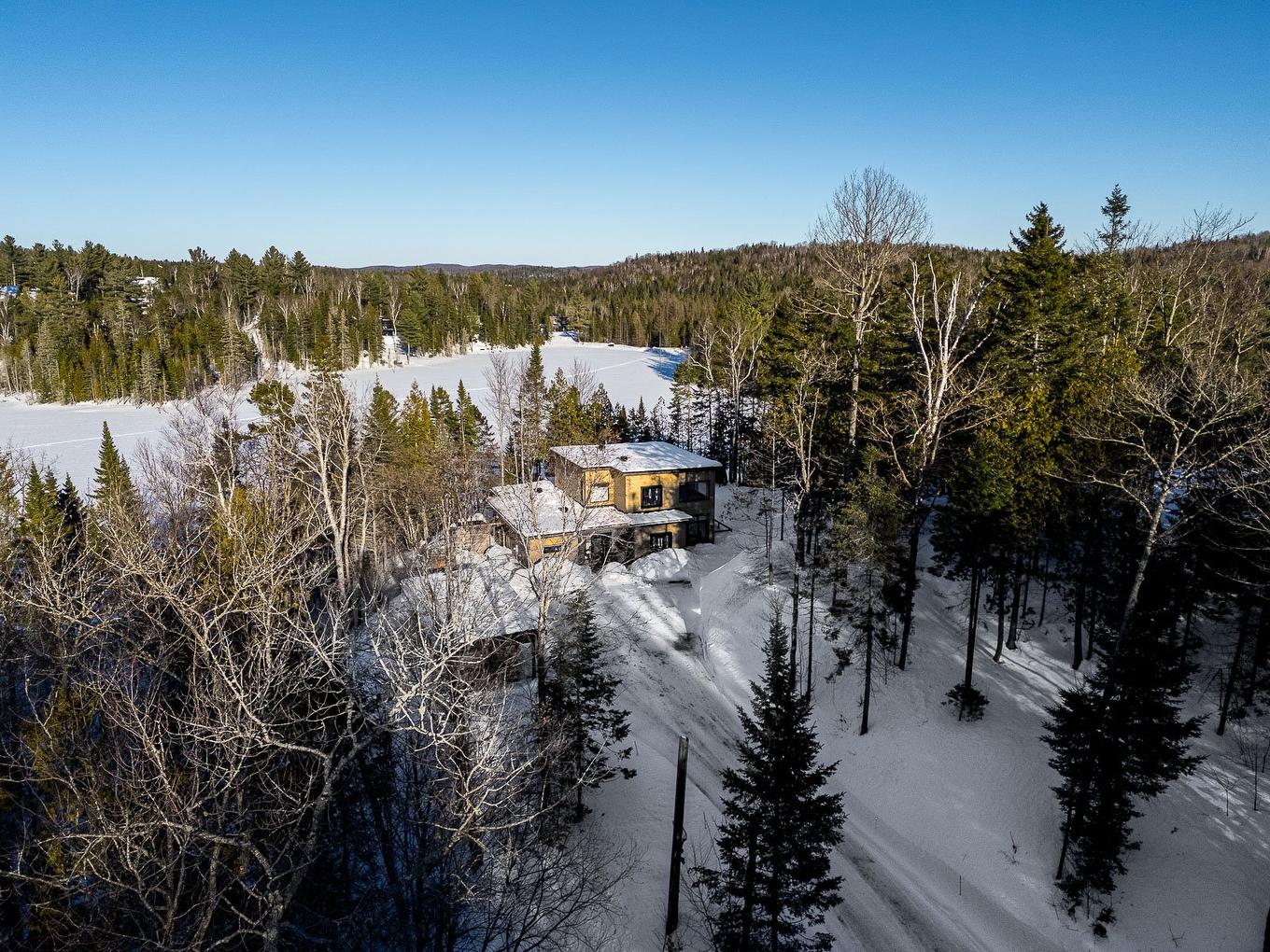 Photo aérienne - 25 Rue Du Randonneur, Sainte-Marguerite-Du-Lac-Masson, QC - Outdoor With View