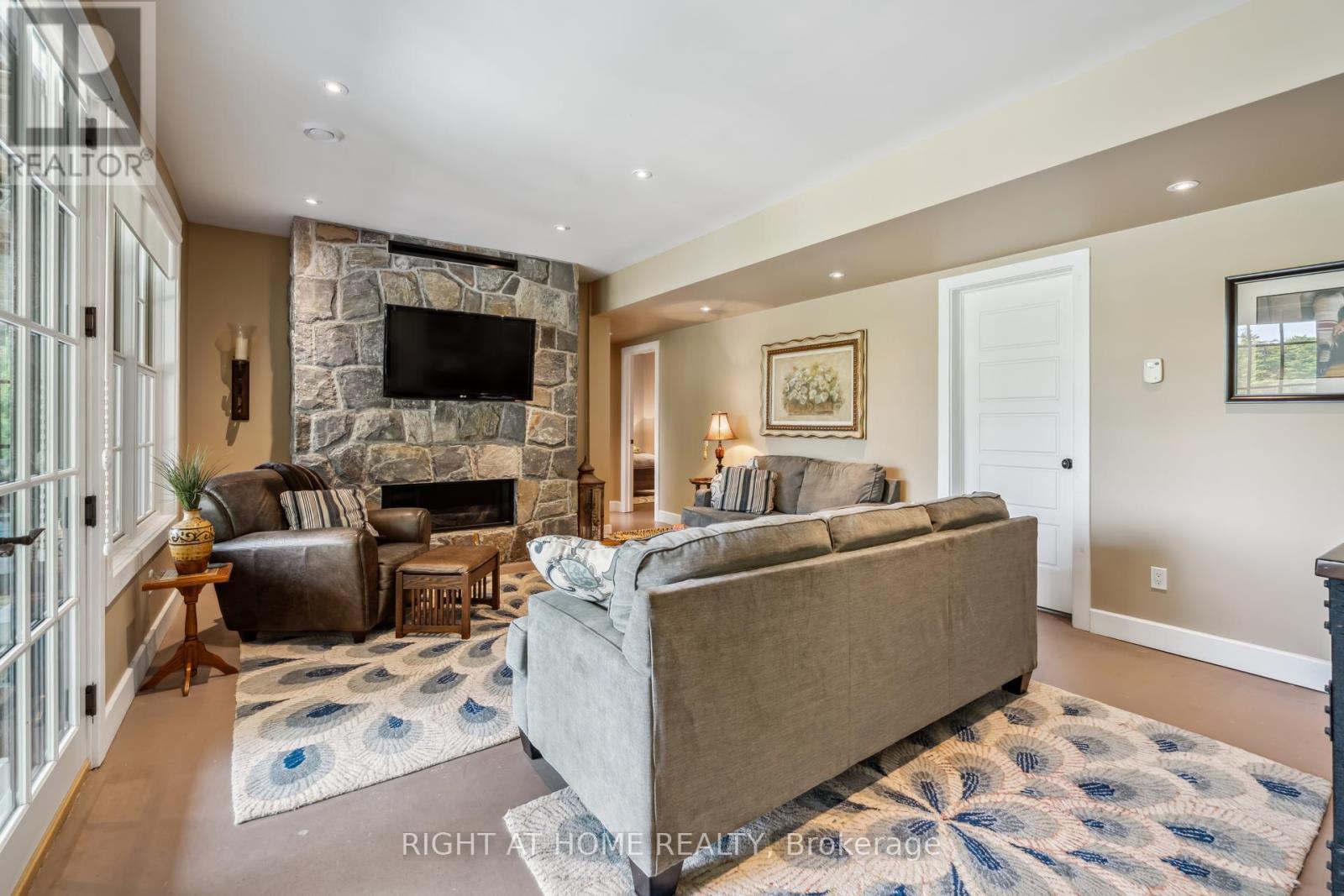 302 Fire Route 93A Route, Havelock-Belmont-Methuen, ON - Indoor Photo Showing Living Room With Fireplace