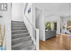 Foyer into living, dining and kitchen -