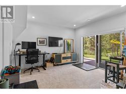 Lower level rec room with access to yard. -