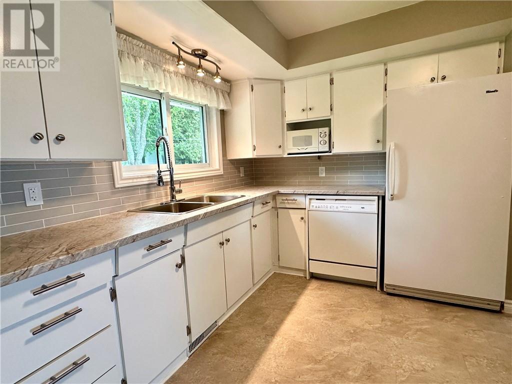 1393 A & B Highway 551, Mindemoya, Manitoulin Island, ON - Indoor Photo Showing Kitchen With Double Sink