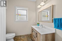 Powder room off of kitchen -