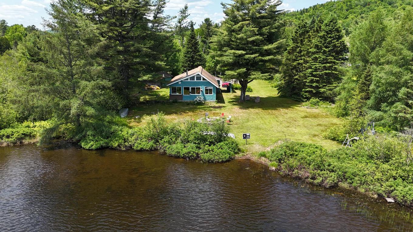 Frontage - 2301 Rue St-Hilaire, Val-Morin, QC - Outdoor With Body Of Water