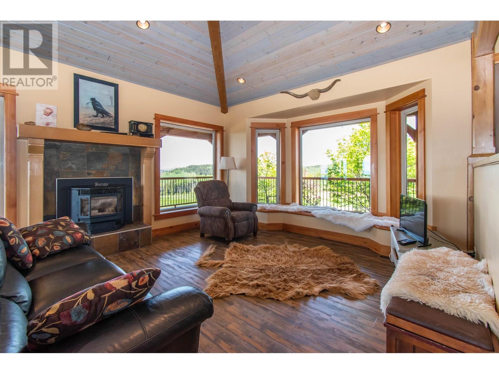 6536 Boundary Road, Telkwa, BC - Indoor Photo Showing Living Room With Fireplace