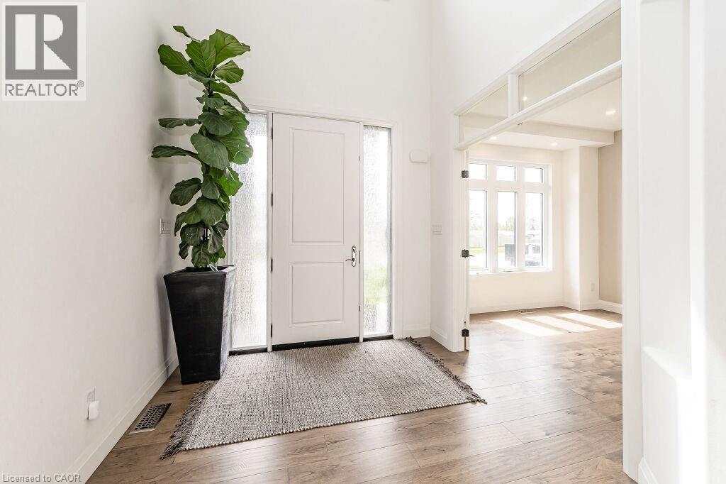 Foyer featuring wood finished floors and baseboards - 346 Lexington Road, Waterloo, ON - Indoor Photo Showing Other Room