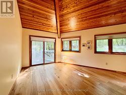 Master bedroom with walkout to private patio. -