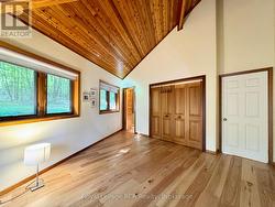 Double closets & vaulted wood ceilings. -