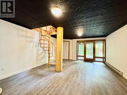 Leading to family room with walkout to waterside. -