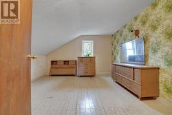 Bedroom 2 with wood floors -